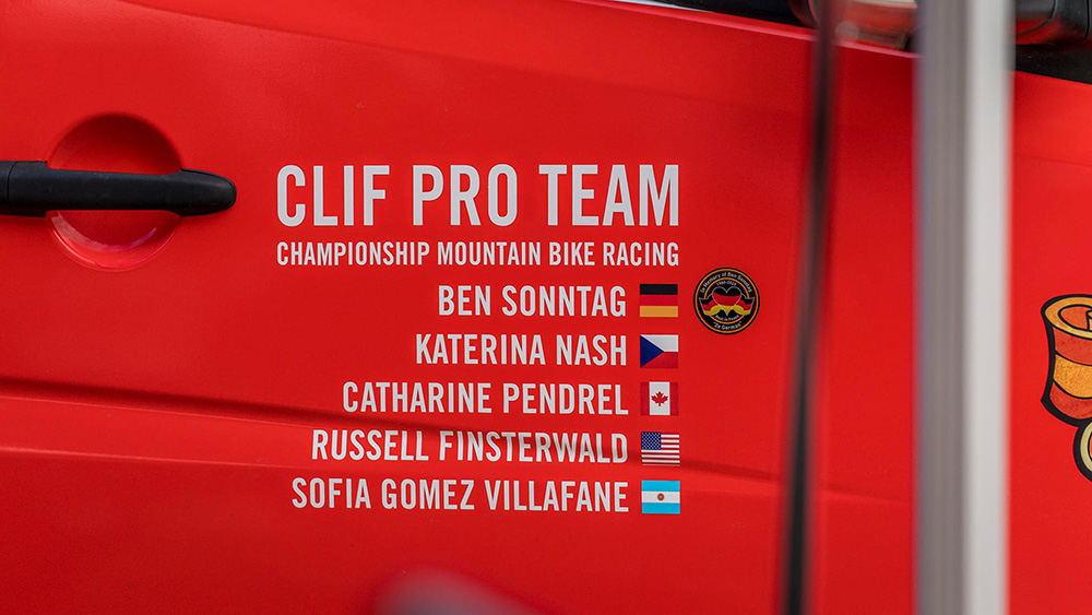 The CLIF Team rostered decaled on the side of their team van. 